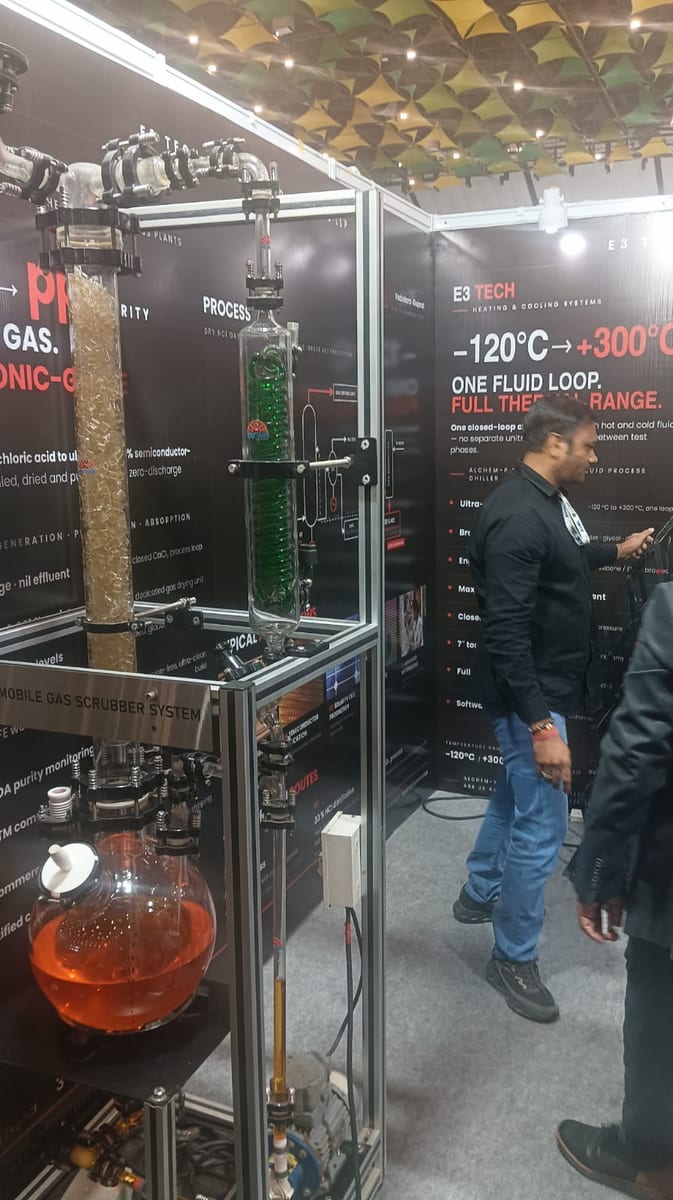 Mobile gas scrubber and high-purity process columns at a small-supplier semiconductor booth at SEMICON India 2026, Yashobhoomi, Dwarka